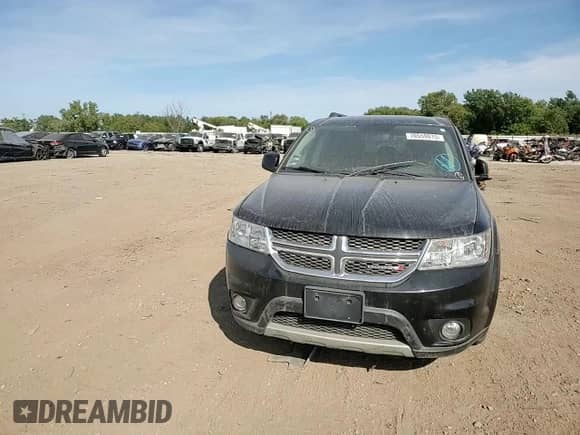 2013 Dodge Journey SXT with VIN 3C4PDCBB1DT722833, listed as a Copart auction lot 70559015 with 198,104 mi miles and Salvage title. Bid and sale history available at DreamBid. Image 14.