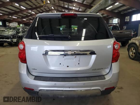 2012 Chevrolet Equinox LTZ z VIN 2GNFLGEK5C6142724, wystawiony jako Copart lot #57130465 z przebiegiem 177 559 mil mil oraz Czysty tytuł • Clean title. Historia ofert i sprzedaży dostępna na DreamBid. Obrazek 6.