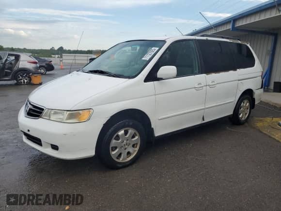2003 Honda Odyssey EX с VIN 5FNRL18633B088786, выставлен на аукционе Copart как лот 71127925 с пробегом 258 942 миль миль и Списание • Salvage title. История ставок и продаж доступна на DreamBid. Изображение 1.