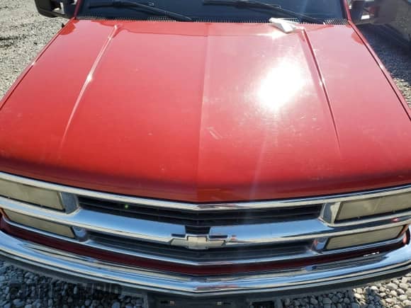 1999 Chevrolet Suburban with VIN 3GNGC26R6XG194781, listed as a Copart auction lot 68814755 with 115,724 mi miles and Salvage title. Bid and sale history available at DreamBid. Image 12.