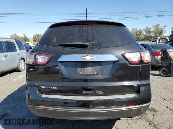 2017 Chevrolet Traverse LT с VIN 1GNKRHKD9HJ137805, выставлен на аукционе Copart как лот 90117475 с пробегом 187 168 миль миль и Списание • Salvage title. История ставок и продаж доступна на DreamBid. Изображение 6.