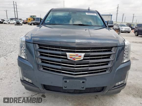 2019 Cadillac Escalade Premium Luxury with VIN 1GYS4CKJ1KR263563, listed as a Copart auction lot 58036455 with 75,286 mi miles and Clean title. Bid and sale history available at DreamBid. Image 5.