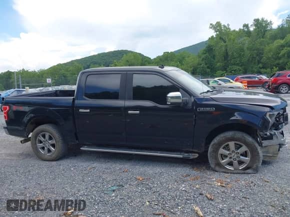 2020 Ford F-150 XLT with VIN 1FTEW1EP9LFA78990, listed as a IAAI auction lot 42708339 with 83,873 mi miles and . Bid and sale history available at DreamBid. Image 13.