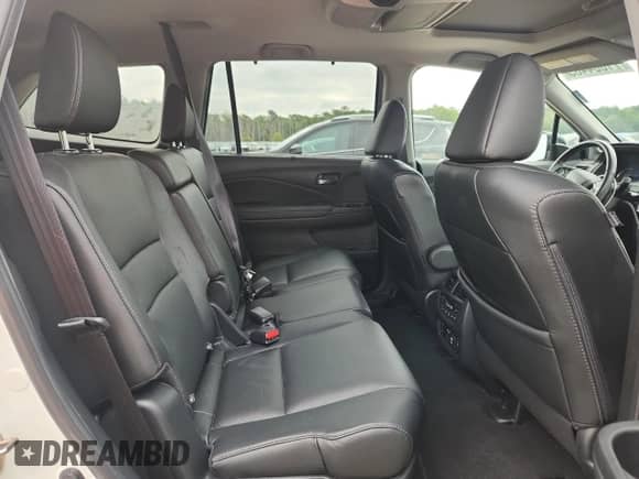 2019 Honda Pilot Touring 8-Passenger z VIN 5FNYF5H91KB018111, wystawiony jako Copart lot #71864465 z przebiegiem 96 937 mil mil oraz Szkoda całkowita • Salvage title. Historia ofert i sprzedaży dostępna na DreamBid. Obrazek 11.