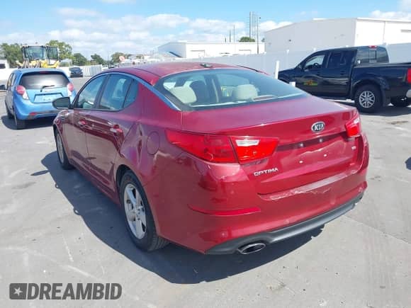 2014 Kia Optima LX with VIN 5XXGM4A73EG269864, listed as a IAAI auction lot 43489558 with 117,422 mi miles and . Bid and sale history available at DreamBid. Image 3.