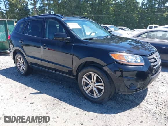 2012 Hyundai Santa Fe SE with VIN 5XYZHDAG8CG117858, listed as a IAAI auction lot 43088165 with 147,208 mi miles and . Bid and sale history available at DreamBid. Image 1.