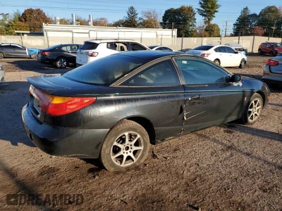 2002 Saturn SC z VIN 1G8ZY127X2Z237460, wystawiony jako Copart lot #87125695 z przebiegiem 183 983 mil mil oraz Szkoda całkowita • Salvage title. Historia ofert i sprzedaży dostępna na DreamBid. Obrazek 3.
