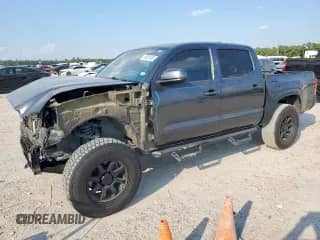 2020 Toyota Tacoma SR5 with VIN 3TMCZ5AN1LM358638, listed as a Copart auction lot 80831835 with 118,576 mi miles and Salvage title. Bid and sale history available at DreamBid. Image 1.