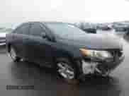 2013 Toyota Camry L with VIN 4T1BF1FK8DU281383, listed as a IAAI auction lot 43282445 with 249,599 mi miles and . Bid and sale history available at DreamBid. Image 1.