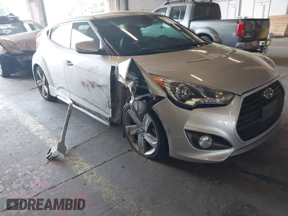 2013 Hyundai Veloster Turbo с VIN KMHTC6AEXDU145719, выставлен на аукционе IAAI как лот 43144474 с пробегом 51 191 миль миль и . История ставок и продаж доступна на DreamBid. Изображение 1.