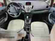 2012 Ford Fiesta SEL with VIN 3FADP4CJ0CM161142, listed as a Copart auction lot 71066055 with 151,522 mi miles and Salvage title. Bid and sale history available at DreamBid. Image 8.