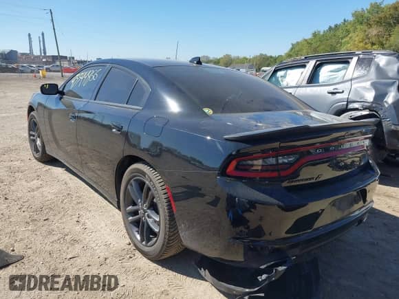 2019 Dodge Charger SXT with VIN 2C3CDXJG6KH743223, listed as a IAAI auction lot 43344866 with 55,661 mi miles and . Bid and sale history available at DreamBid. Image 3.