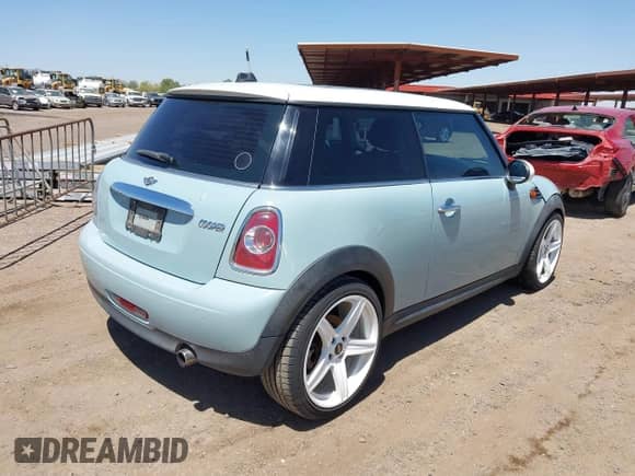 2012 MINI Hardtop with VIN WMWSU3C51CT261434, listed as a IAAI auction lot 42569468 with 100,930 mi miles and . Bid and sale history available at DreamBid. Image 4.