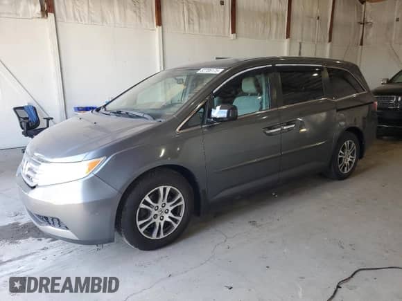 2013 Honda Odyssey EX с VIN 5FNRL5H40DB026656, выставлен на аукционе Copart как лот 82706175 с пробегом 167 669 миль миль и Чистый • Clean title. История ставок и продаж доступна на DreamBid. Изображение 1.