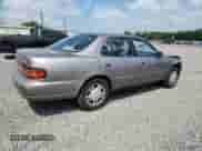 1993 Toyota Camry с VIN 4T1VK13E1PU075530, выставлен на аукционе Copart как лот 64218835 с пробегом 58 871 миль миль и Списание • Salvage title. История ставок и продаж доступна на DreamBid. Изображение 3.