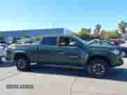 2021 Toyota Tacoma SR5 z VIN 3TMDZ5BN8MM114649, wystawiony jako IAAI lot #43493615 z przebiegiem 63 288 mil mil oraz . Historia ofert i sprzedaży dostępna na DreamBid. Obrazek 14.