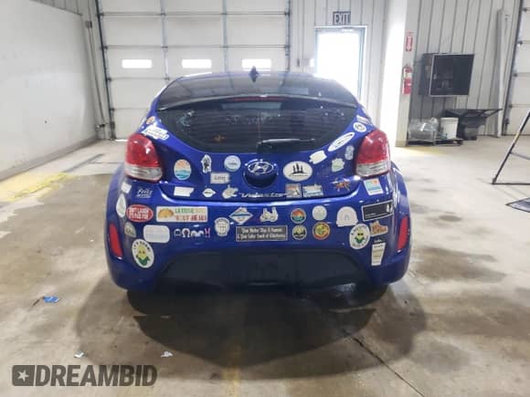 2012 Hyundai Veloster w/Black Int z VIN KMHTC6AD3CU078659, wystawiony jako Copart lot #71902465 z przebiegiem 130 632 mil mil oraz Szkoda całkowita • Salvage title. Historia ofert i sprzedaży dostępna na DreamBid. Obrazek 6.