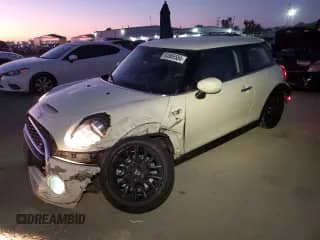 2021 MINI Hardtop Cooper S with VIN WMWXR5C07M2N02993, listed as a Copart auction lot 83905584 with 57,585 mi miles and Salvage title. Bid and sale history available at DreamBid. Image 1.
