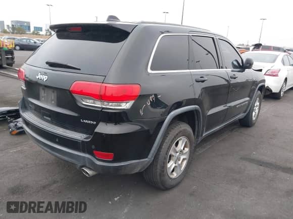 2017 Jeep Grand Cherokee Altitude with VIN 1C4RJEAG9HC685445, listed as a IAAI auction lot 42164503 with 80,898 mi miles and . Bid and sale history available at DreamBid. Image 4.