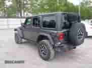 2025 Jeep Wrangler Rubicon with VIN 1C4PJXFN7SW521501, listed as a IAAI auction lot 42906778 with 7,819 mi miles and . Bid and sale history available at DreamBid. Image 3.