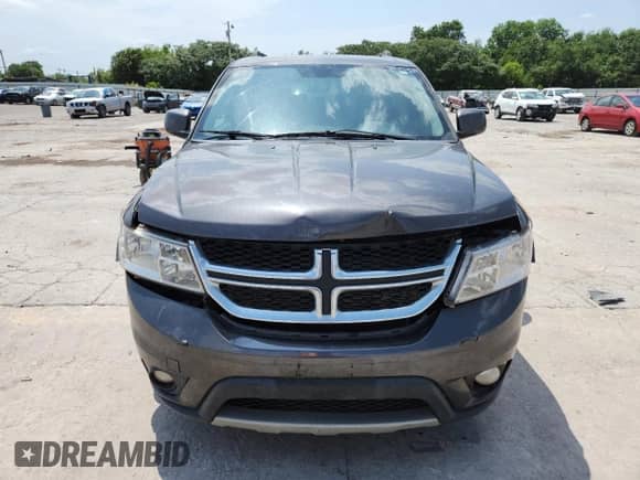 2016 Dodge Journey SXT with VIN 3C4PDCBG7GT145872, listed as a Copart auction lot 64283285 with 163,401 mi miles and Salvage title. Bid and sale history available at DreamBid. Image 5.
