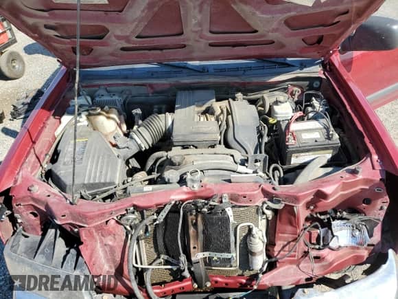 2006 Chevrolet Colorado 1LT z VIN 1GCDT196568215809, wystawiony jako Copart lot #66411014 z przebiegiem 103 009 mil mil oraz Czysty tytuł • Clean title. Historia ofert i sprzedaży dostępna na DreamBid. Obrazek 13.