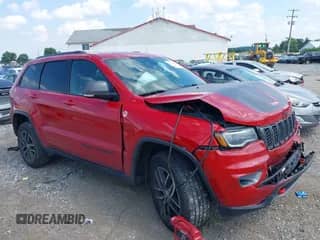 2018 Jeep Grand Cherokee Trailhawk z VIN 1C4RJFLG3JC304147, wystawiony jako IAAI lot #42611034 z przebiegiem 117 146 mil mil oraz . Historia ofert i sprzedaży dostępna na DreamBid. Obrazek 1.