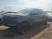 2025 Ram 1500 Tradesman with VIN 1C6RRFGG0SN646400, listed as a Copart auction lot 65794815 with 9,838 mi miles and Salvage title. Bid and sale history available at DreamBid. Image 1.