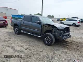 2017 Toyota Tacoma SR5 with VIN 3TMAZ5CN7HM026618, listed as a IAAI auction lot 42033682 with 96,430 mi miles and . Bid and sale history available at DreamBid. Image 1.