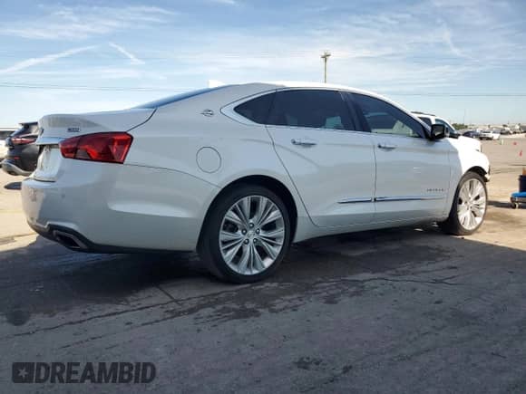 2017 Chevrolet Impala Premier z VIN 1G1145S32HU164294, wystawiony jako Copart lot #70271965 z przebiegiem 130 435 mil mil oraz Szkoda całkowita • Salvage title. Historia ofert i sprzedaży dostępna na DreamBid. Obrazek 3.