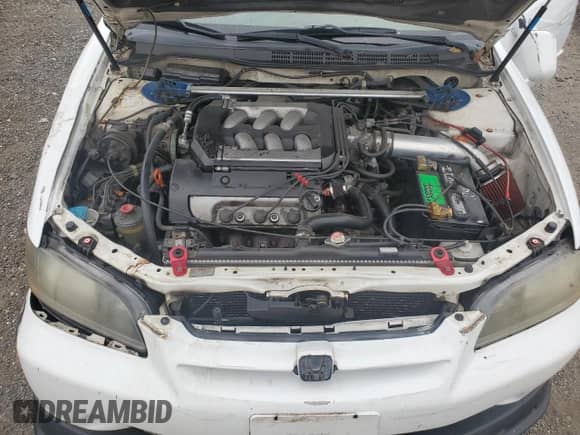 1998 Honda Accord EX with VIN 1HGCG1655WA065187, listed as a Copart auction lot 67232475 with 124,723 mi miles and Salvage title. Bid and sale history available at DreamBid. Image 11.