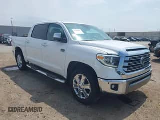 2020 Toyota Tundra Platinum with VIN 5TFGY5F18LX257827, listed as a IAAI auction lot 42308651 with 84,990 mi miles and . Bid and sale history available at DreamBid. Image 1.