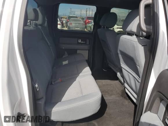 2014 Ford F-150 XLT с VIN 1FTFW1CT1EKE22892, выставлен на аукционе Copart как лот 86332765 с пробегом 14 203 миль миль и Списание • Salvage title. История ставок и продаж доступна на DreamBid. Изображение 10.