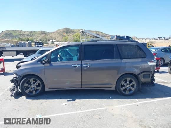 2016 Toyota Sienna SE with VIN 5TDXK3DC4GS708290, listed as a IAAI auction lot 41851812 with 136,544 mi miles and . Bid and sale history available at DreamBid. Image 14.