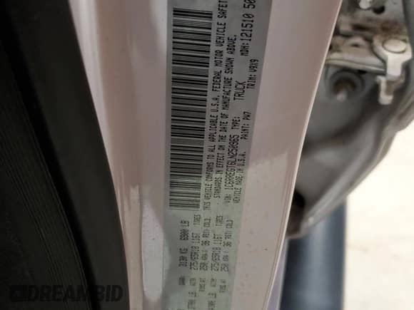 2020 Ram 1500 Tradesman with VIN 1C6RREGT6LN250965, listed as a Copart auction lot 86255105 with 201,906 mi miles and Clean title. Bid and sale history available at DreamBid. Image 12.