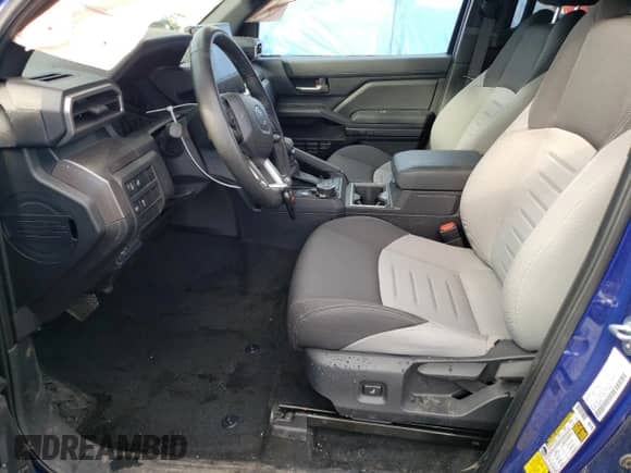 2024 Toyota Tacoma SR5 with VIN 3TMLB5JN1RM002946, listed as a Copart auction lot 68039525 with 21,113 mi miles and Salvage title. Bid and sale history available at DreamBid. Image 7.