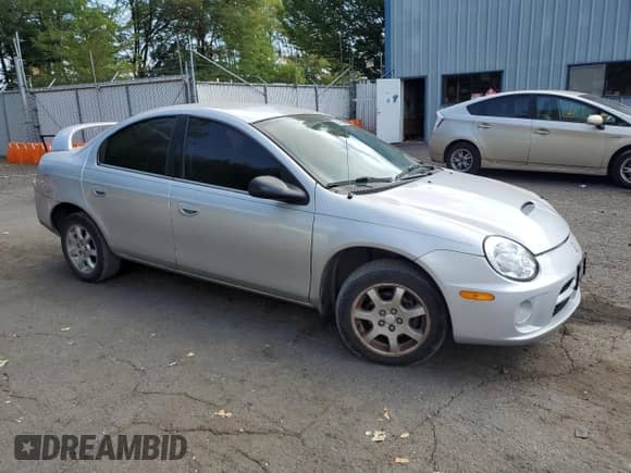 2005 Dodge Neon SXT z VIN 1B3AS56C25D240407, wystawiony jako Copart lot #67846655 z przebiegiem 143 280 mil mil oraz Szkoda całkowita • Salvage title. Historia ofert i sprzedaży dostępna na DreamBid. Obrazek 4.