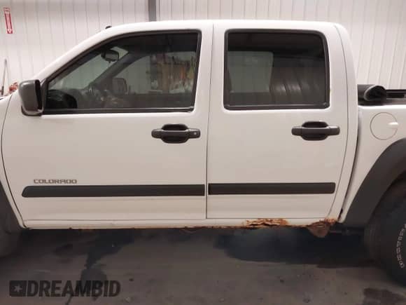 2005 Chevrolet Colorado 1SB LS Z85 с VIN 1GCDT136458223682, выставлен на аукционе IAAI как лот 40728025 с пробегом 169 516 миль миль и . История ставок и продаж доступна на DreamBid. Изображение 14.