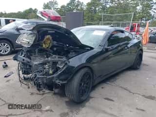 2015 Hyundai Genesis Coupe Ultimate z VIN KMHHU6KJ5FU129803, wystawiony jako IAAI lot #43268302 z przebiegiem 97 986 mil mil oraz . Historia ofert i sprzedaży dostępna na DreamBid. Obrazek 2.