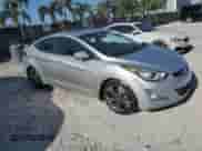 2015 Hyundai Elantra Sport with VIN KMHDH4AH5FU283062, listed as a Copart auction lot 54985475 with 144,542 mi miles and Clean title. Bid and sale history available at DreamBid. Image 4.