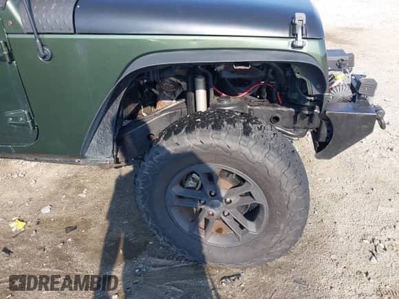 2007 Jeep Wrangler Unlimited X с VIN 1J4GA39197L115109, выставлен на аукционе IAAI как лот 42582190 с пробегом 141 080 миль миль и . История ставок и продаж доступна на DreamBid. Изображение 6.