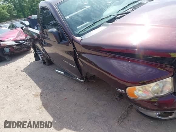 2005 Dodge 1500 SLT z VIN 1D7HU16D95J580086, wystawiony jako IAAI lot #42277801 z przebiegiem 93 975 mil mil oraz . Historia ofert i sprzedaży dostępna na DreamBid. Obrazek 6.