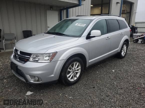 2014 Dodge Journey SXT with VIN 3C4PDCBB8ET180650, listed as a Copart auction lot 85146925 with 181,951 mi miles and Salvage title. Bid and sale history available at DreamBid. Image 1.