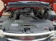 2002 GMC Sierra 1500 z VIN 1GTEC14W52Z338669, wystawiony jako Copart lot #53890055 z przebiegiem Nie podano mil oraz Szkoda całkowita • Salvage title. Historia ofert i sprzedaży dostępna na DreamBid. Obrazek 11.