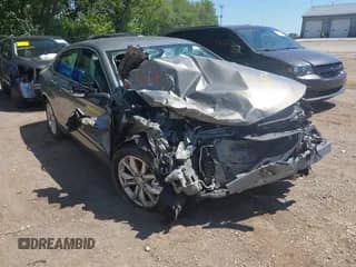 2018 Chevrolet Impala LT with VIN 2G1105SAXJ9137616, listed as a IAAI auction lot 42857212 with 148,357 mi miles and . Bid and sale history available at DreamBid. Image 1.