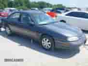 1996 Chevrolet Lumina z VIN 2G1WL52M6T9124713, wystawiony jako IAAI lot #42306378 z przebiegiem 140 750 mil mil oraz . Historia ofert i sprzedaży dostępna na DreamBid. Obrazek 1.