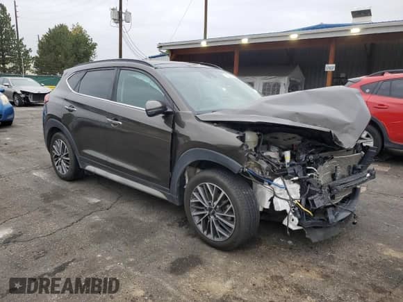 2019 Hyundai Tucson Ultimate with VIN KM8J3CALXKU987025, listed as a Copart auction lot 71664575 with 70,711 mi miles and Salvage title. Bid and sale history available at DreamBid. Image 4.