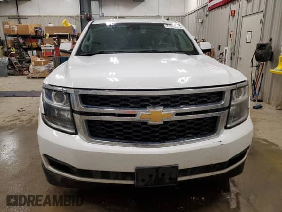 2020 Chevrolet Suburban LT z VIN 1GNSKHKC0LR268448, wystawiony jako Copart lot #71002325 z przebiegiem 190 317 mil mil oraz Czysty tytuł • Clean title. Historia ofert i sprzedaży dostępna na DreamBid. Obrazek 5.