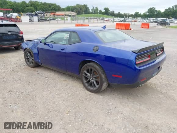 2021 Dodge Challenger GT z VIN 2C3CDZKGXMH567287, wystawiony jako IAAI lot #42492095 z przebiegiem 46 082 mil mil oraz . Historia ofert i sprzedaży dostępna na DreamBid. Obrazek 3.