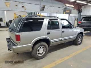 2001 Chevrolet Blazer LT с VIN 1GNDT13W712214351, выставлен на аукционе Copart как лот 70259904 с пробегом 191 799 миль миль и Списание • Salvage title. История ставок и продаж доступна на DreamBid. Изображение 3.
